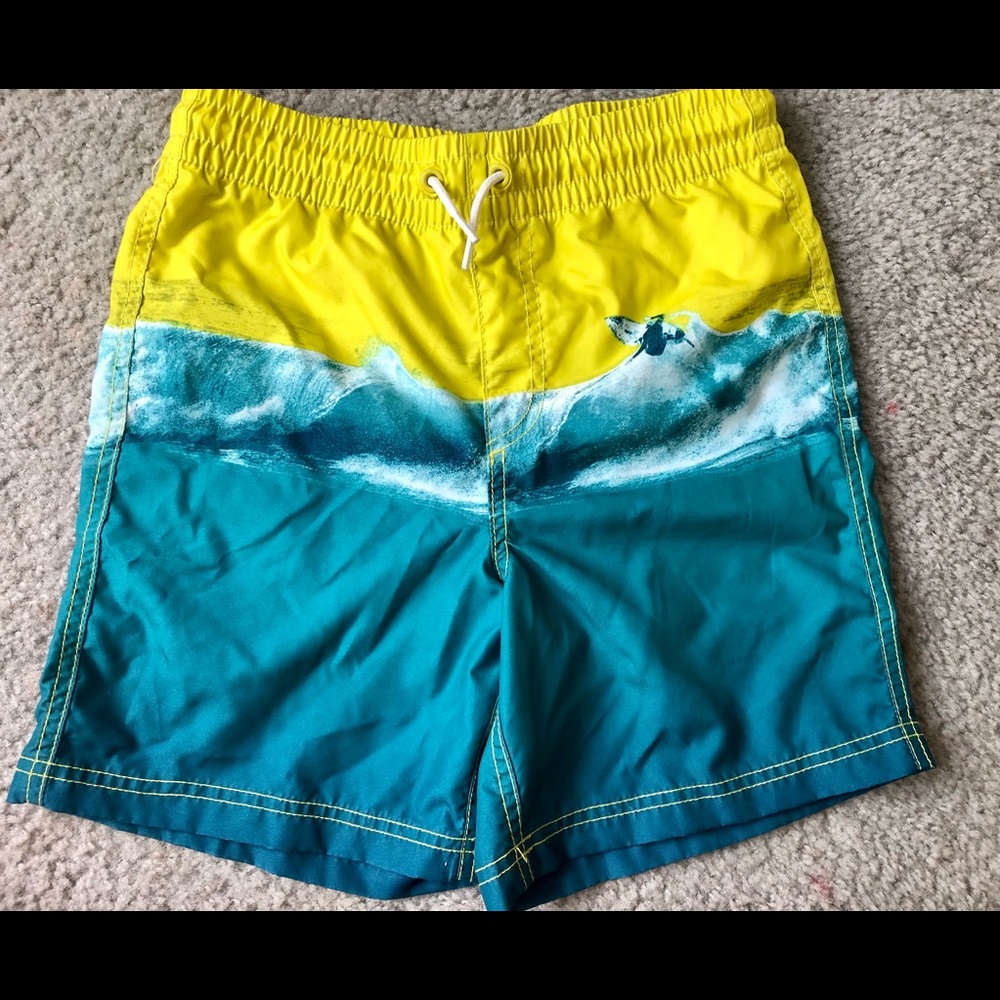 Old Navy boys size 10 swim trunks. Not worn, only tried on.